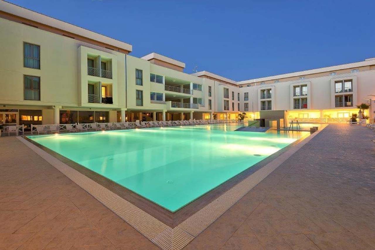 Big outdoor pool during nighttime in Hotel Terme Marine Leopoldo II TERME & SPA