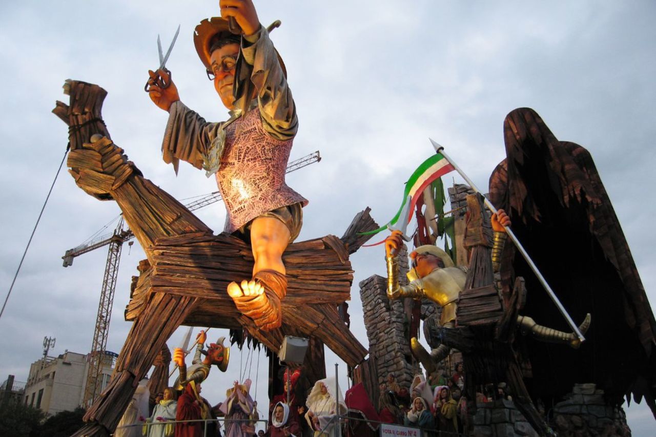 Masked people at the Viareggio Carnival in Tuscany, in winter.